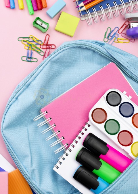 Flat lay back school stationery with backpack